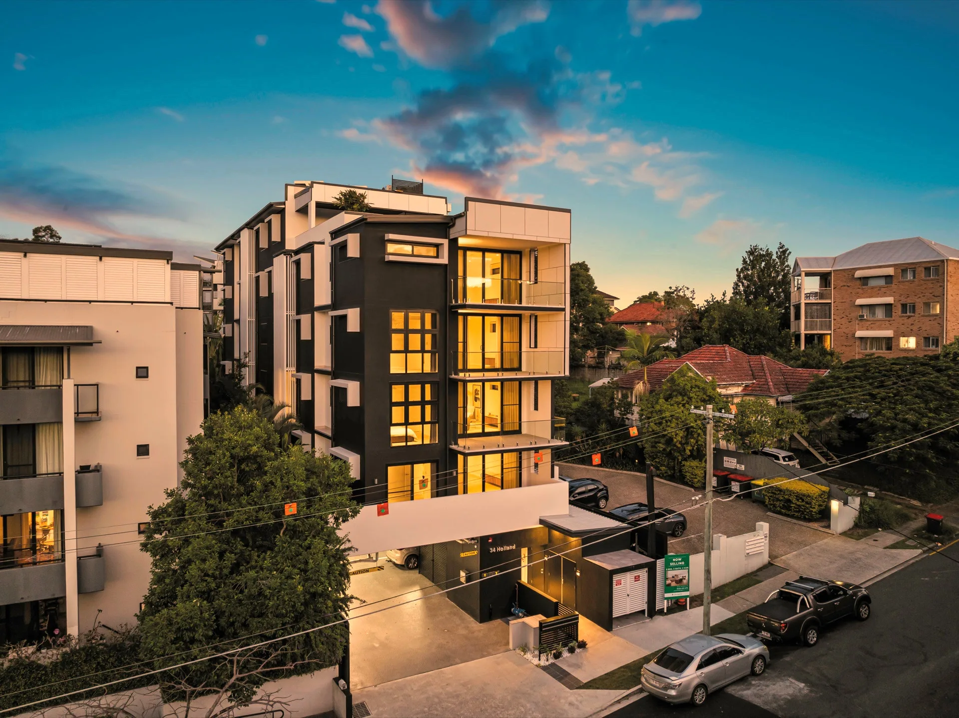 Toowong at dusk, the windows lit